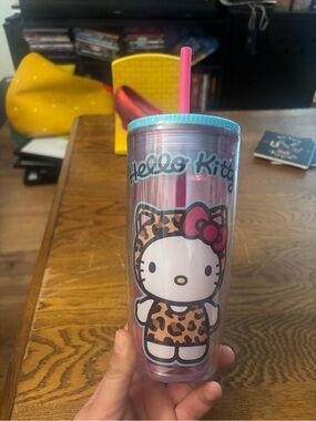Hello kitty cheetah travel mug